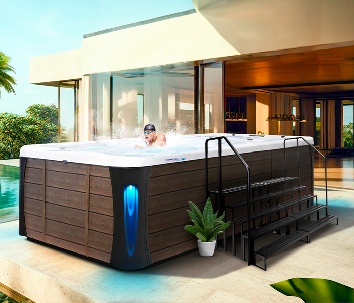 Calspas hot tub being used in a family setting - Sunrise